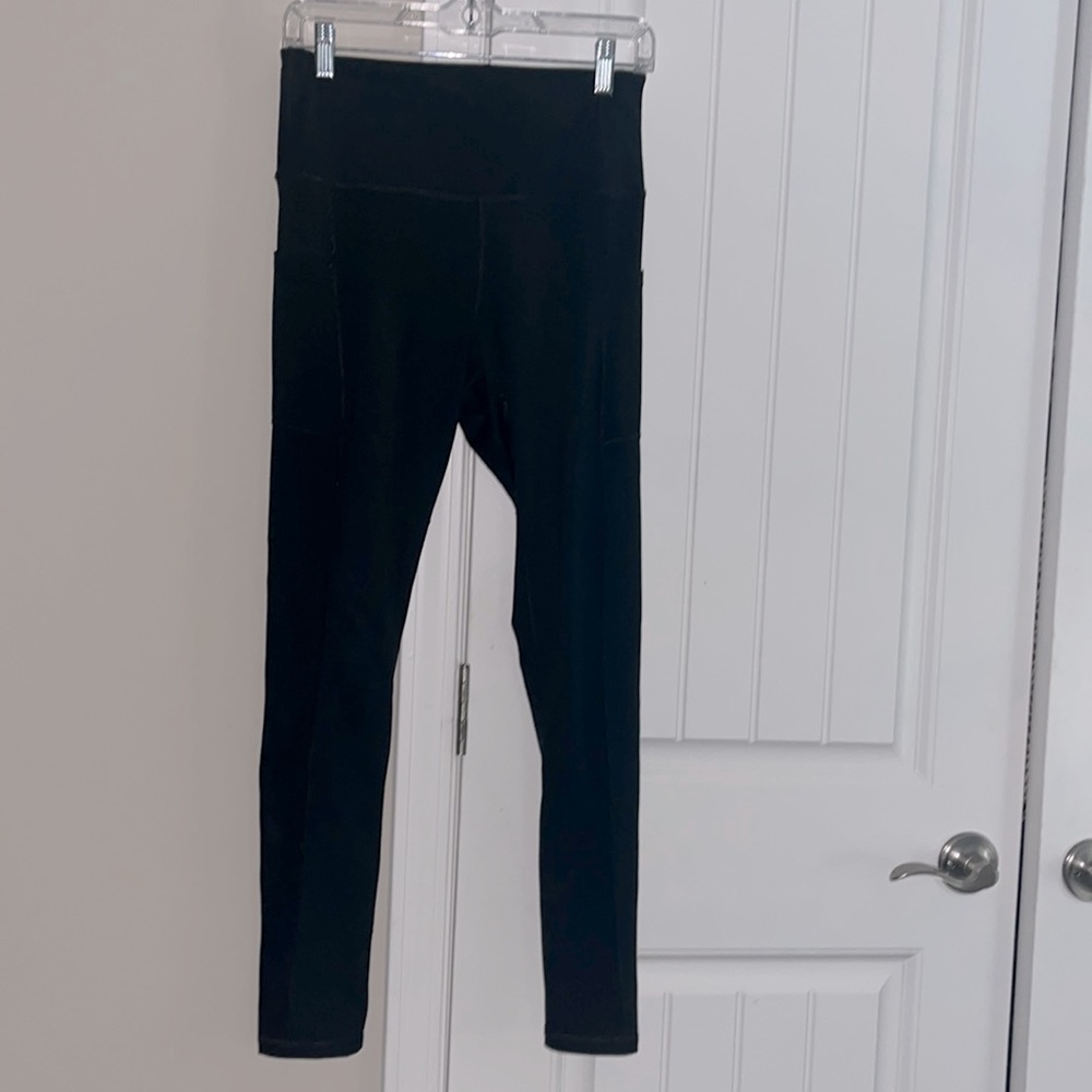 Women’s high waisted black full length leggings with pockets